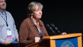 UC Tech Award recipient speaking at the podium.