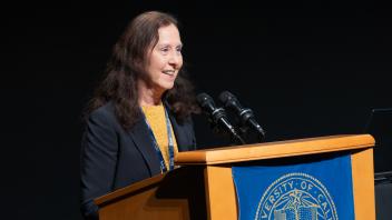 UC Tech Award recipient speaking at the podium.
