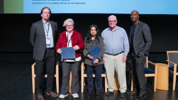 UC Tech Award recipients posing for a photo with CIOs Van Williams and Viji Murali.