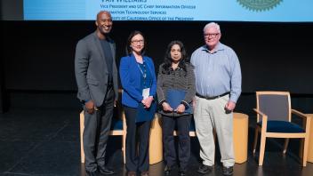 UC Tech Award recipients posing for a photo with CIOs Van Williams and Viji Murali.