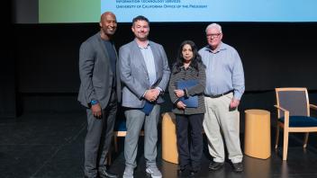 UC Tech Award recipients posing for a photo with CIOs Van Williams and Viji Murali.