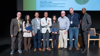 UC Tech Award recipients posing for a photo with CIOs Van Williams and Viji Murali.