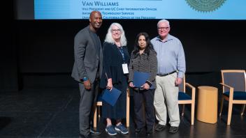 UC Tech Award recipients posing for a photo with CIOs Van Williams and Viji Murali.