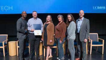 UC Tech Award recipients posing for a photo.