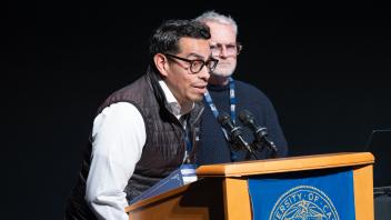 UC Tech Award recipient speaking at the podium.