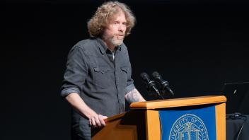 UC Tech Award recipient speaking at the podium.