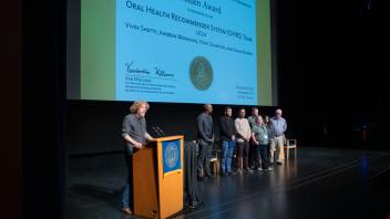 UC Tech Award recipient speaking at the podium.