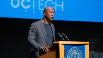 UC Tech Awards Van Williams speaking at the podium.