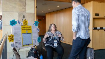UC Tech poster presenter speaking on their poster presentation