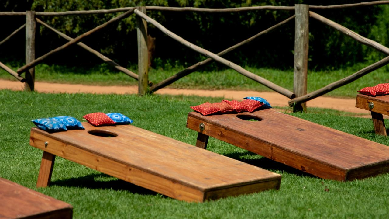 Picture of two cornhole game boards