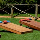 Picture of two cornhole game boards
